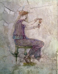 Woman Pouring Perfume into a Phial